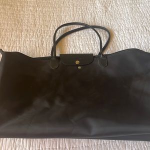 Longchamp black material tote with leather handles and trim